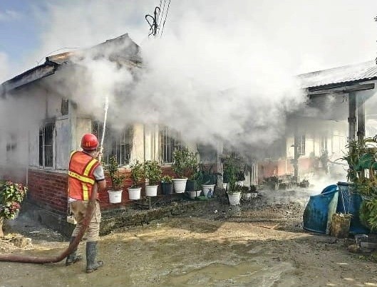 Fire personnel dousing the fire which broke out at Middle PWD Colony, Kohima on December 12. (Photo Courtesy: F&ES)